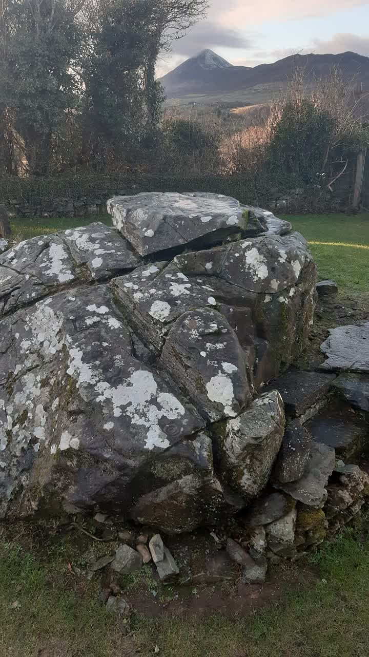 The whole Boheh Stone boulder, with Croagh Patrick behind it.